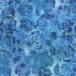 blåt patchworkbatikstof med lilla roser