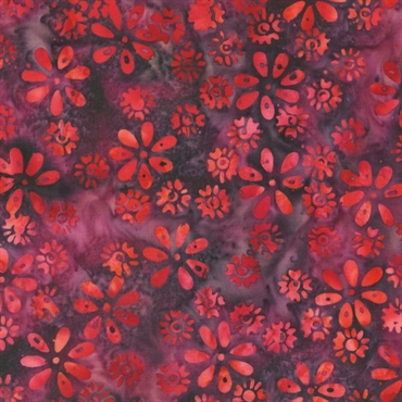Pink og lilla patchworkstof med blomstermotiv