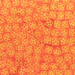 orange patchworkstof med batiktryk