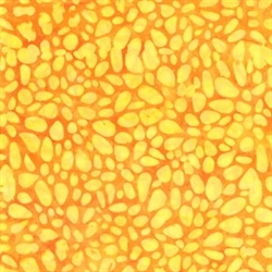 Orange batikstof til patchwork med gule prikker