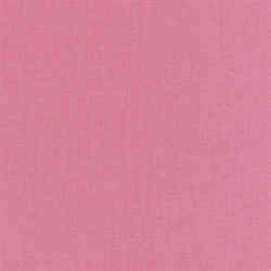 Ensfarvet rosa patchworkstof