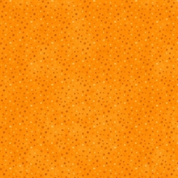 orange patchworkstof med prikker