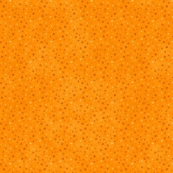 orange patchworkstof med prikker