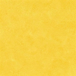 Prikket gult patchworkstof