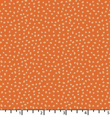 orange patchworkstof med kryds og bolle